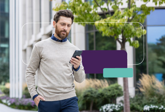 A person checking their savings account on a mobile banking app in the UAE.